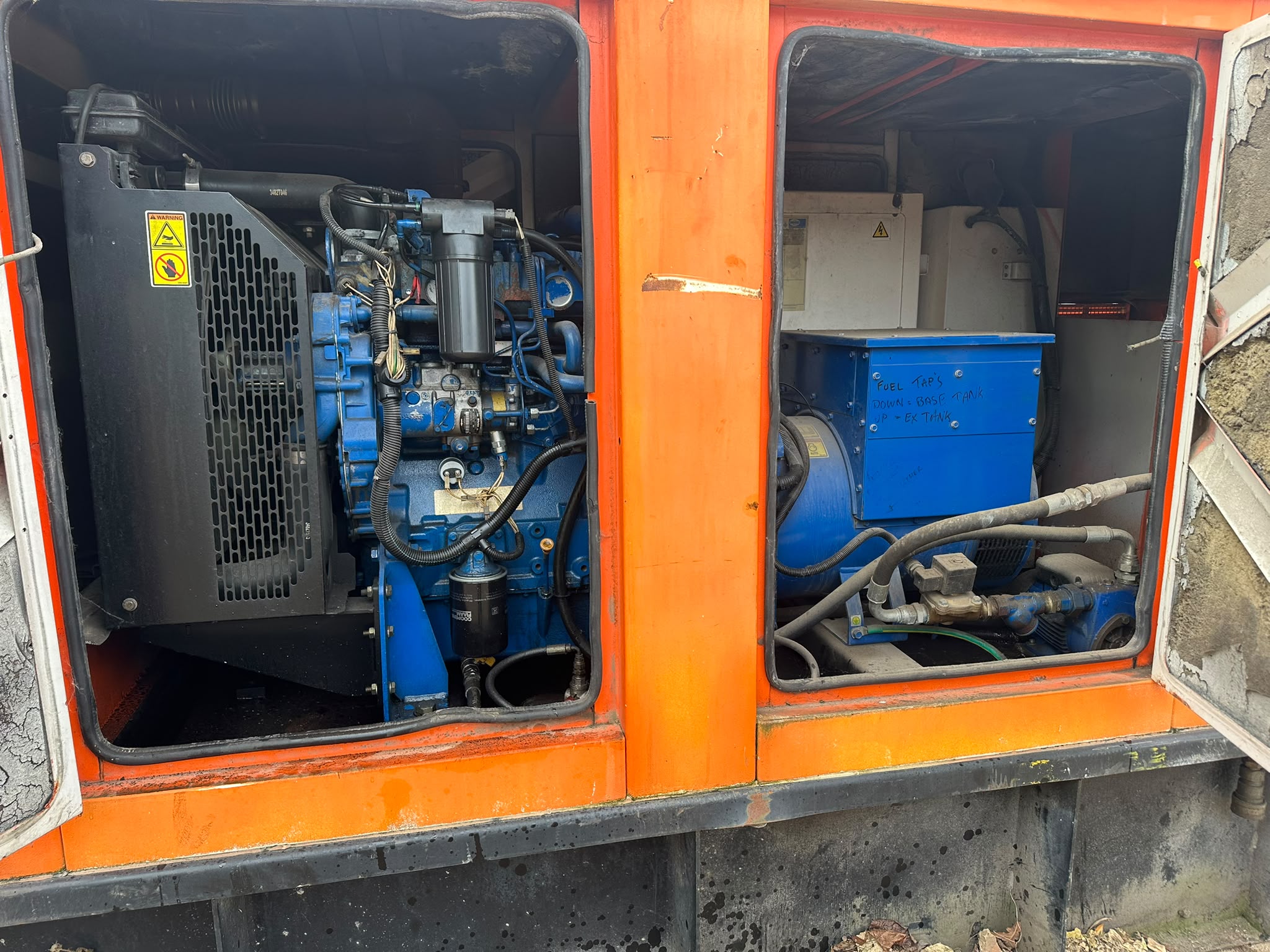 Perkins engine and Stamford alternator with the canopy doors open - used FG Wilson P60 60 kVA generator