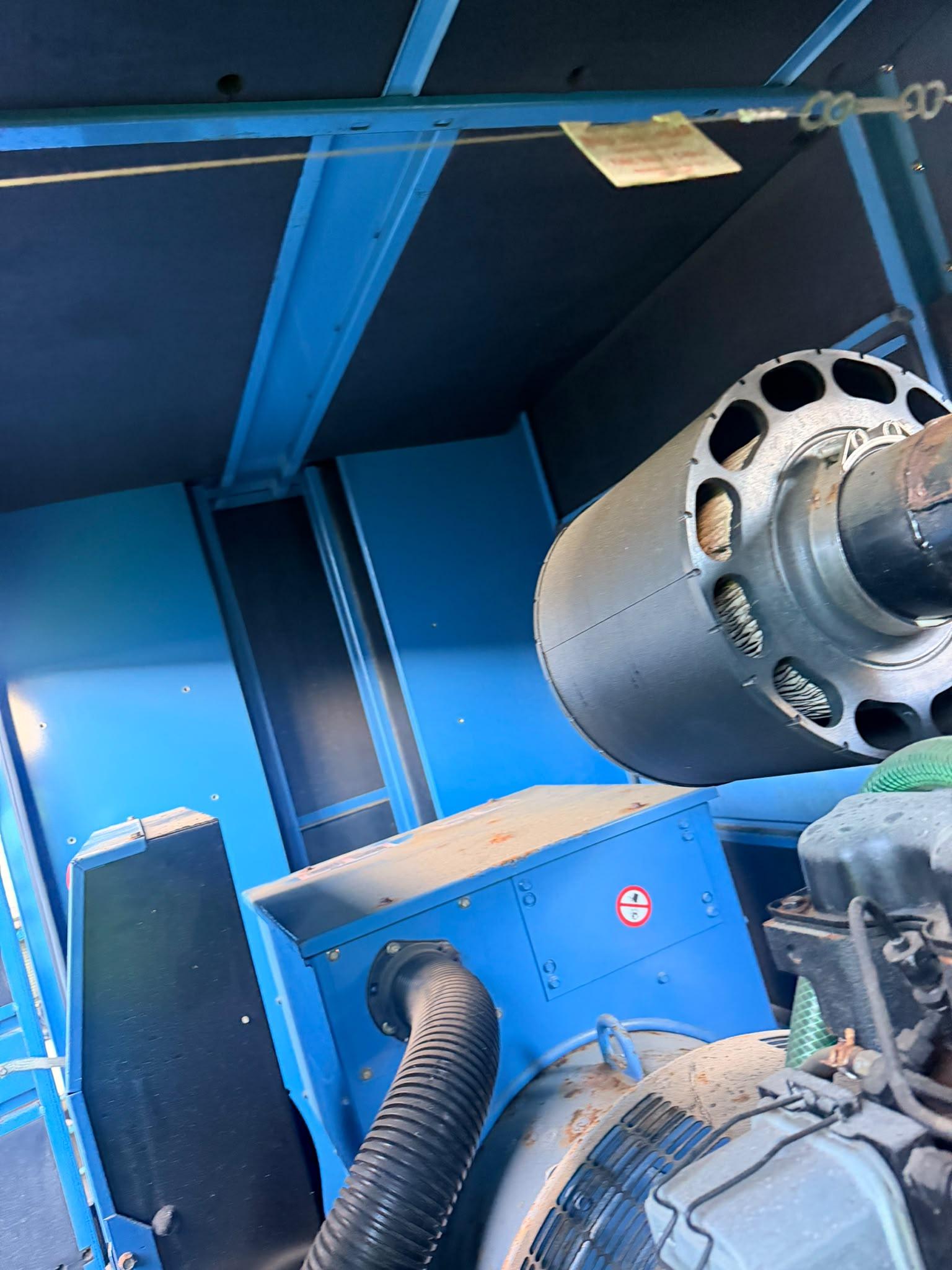 SDMO J300K interior showing the engine air intake and alternator installation